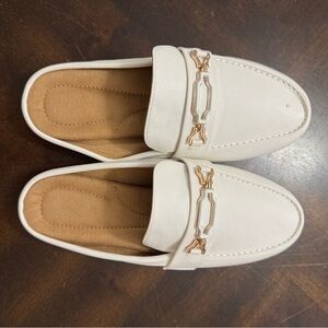Classic White Loafers with Gold Detailing